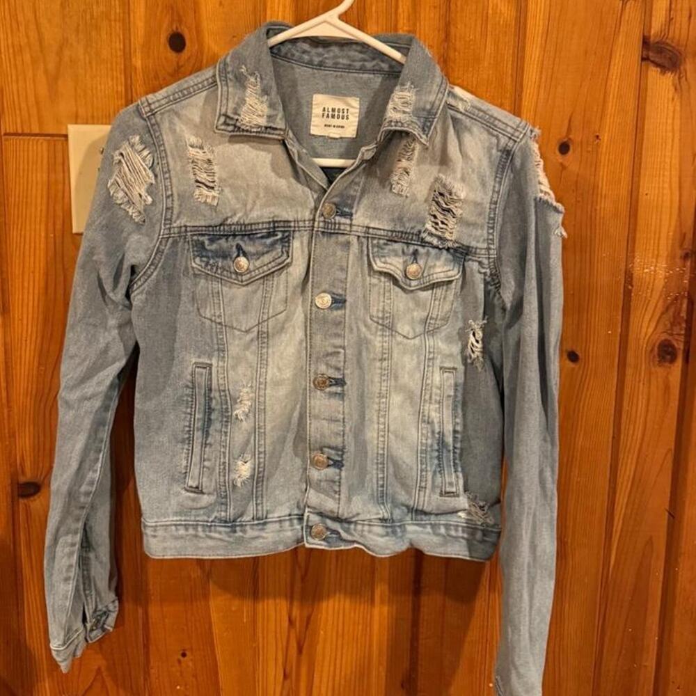 Blue distressed denim jacket